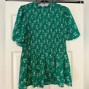 Women’s sheer ruched top.